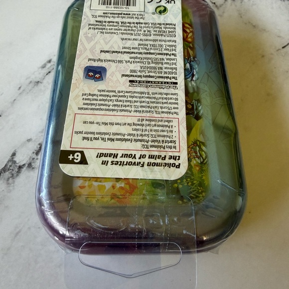 Pokémon Prismatic Evolutions Tin Sylveon - Picture 6 of 6